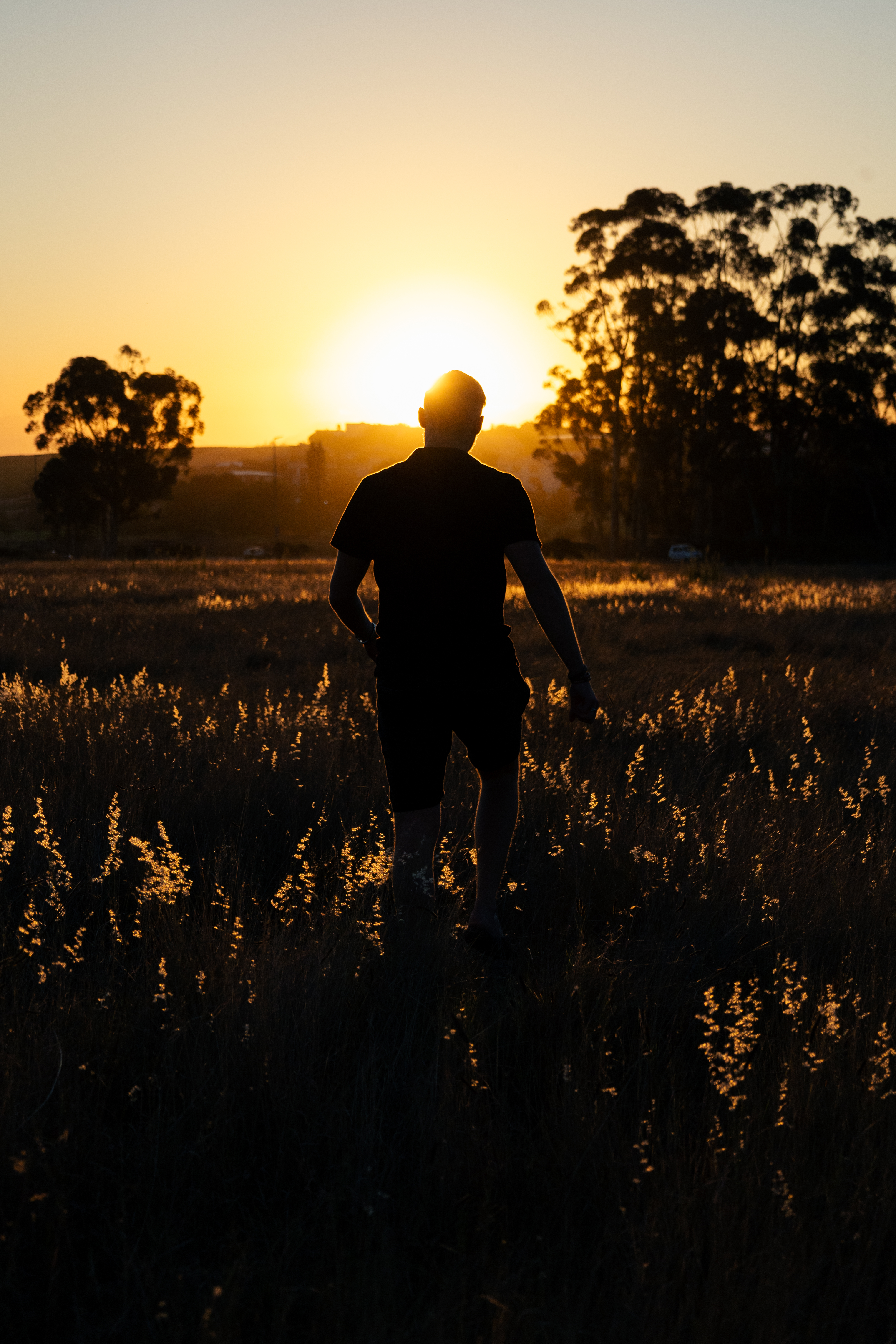 Portrait photography — woman with warm light on blue background